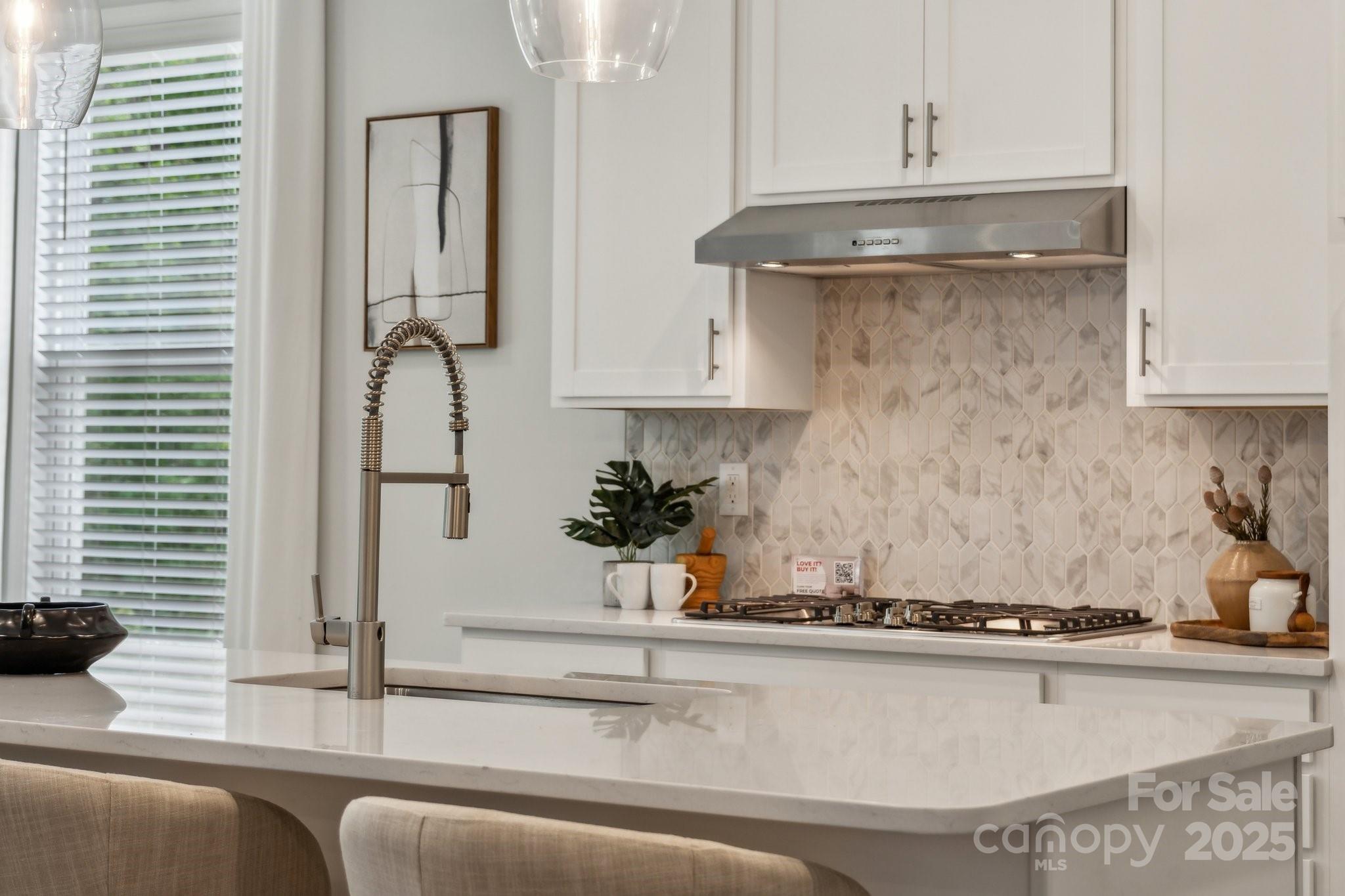 5088 Duval Circle Tega Cay, SC 29708 - Photo 13 of 41 a kitchen with a sink and a window