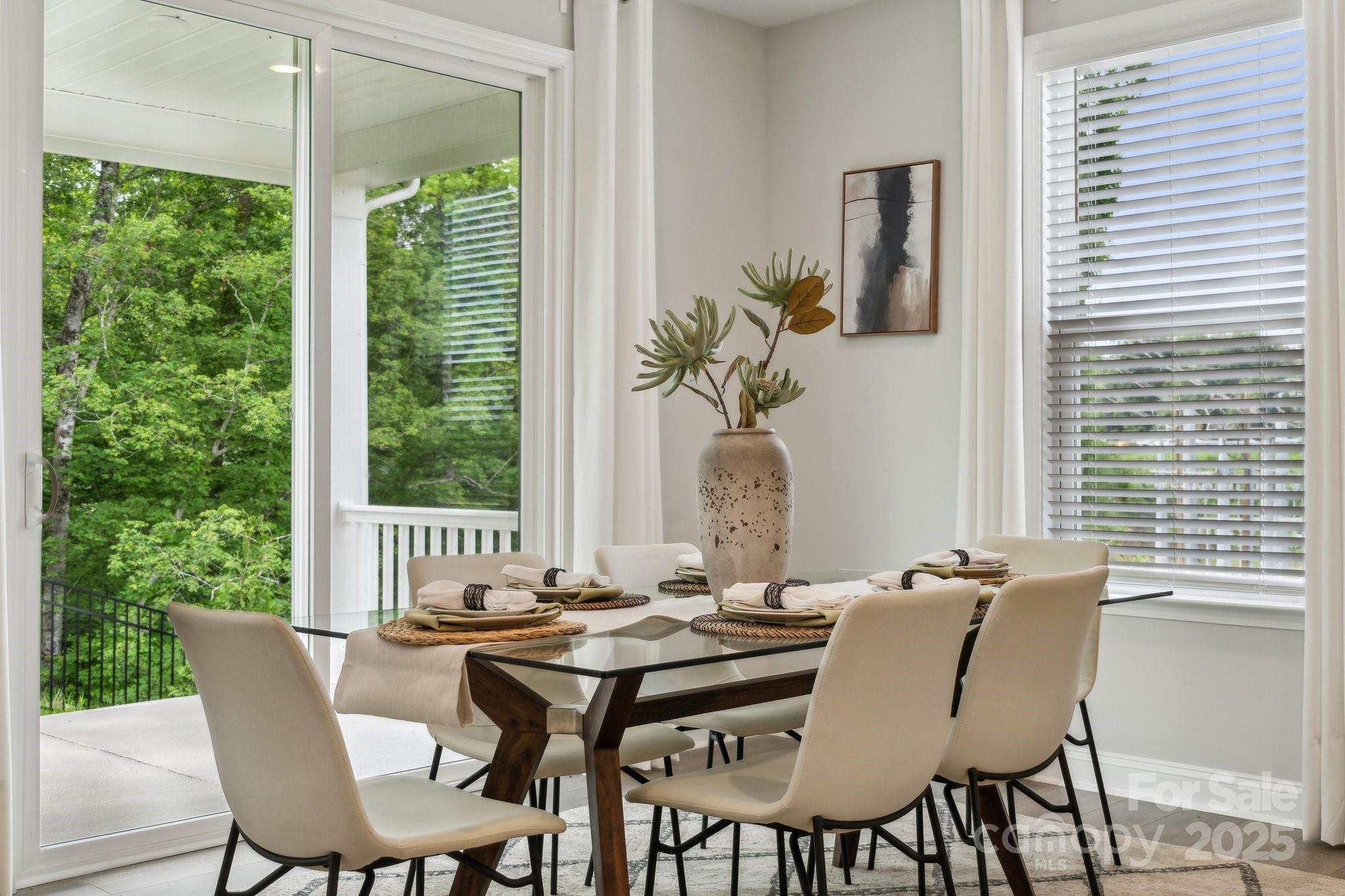 5088 Duval Circle Tega Cay, SC 29708 - Photo 21 of 41 a view of a dining room with furniture window and outside view