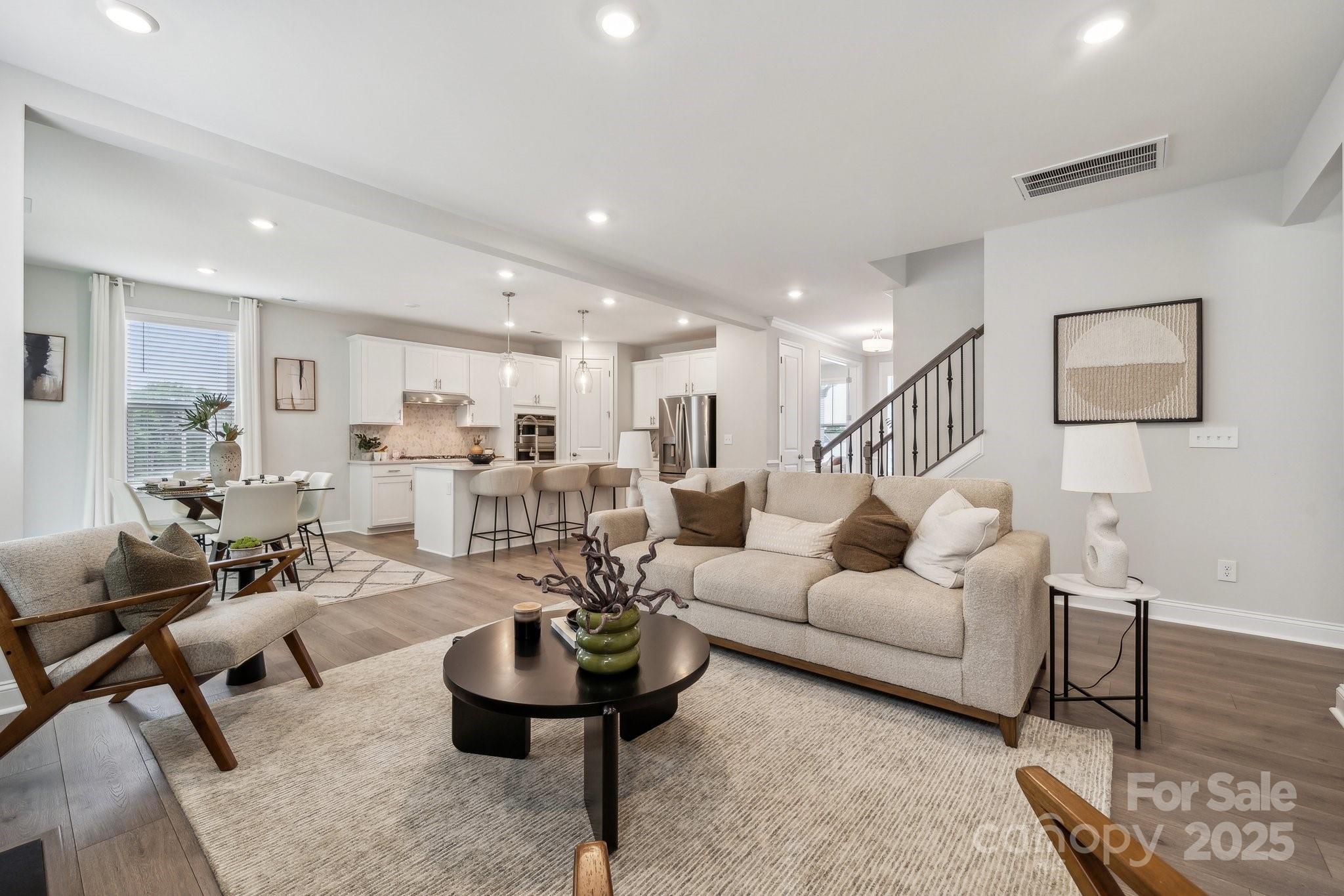 5088 Duval Circle Tega Cay, SC 29708 - Photo 22 of 41 a living room with furniture and a table