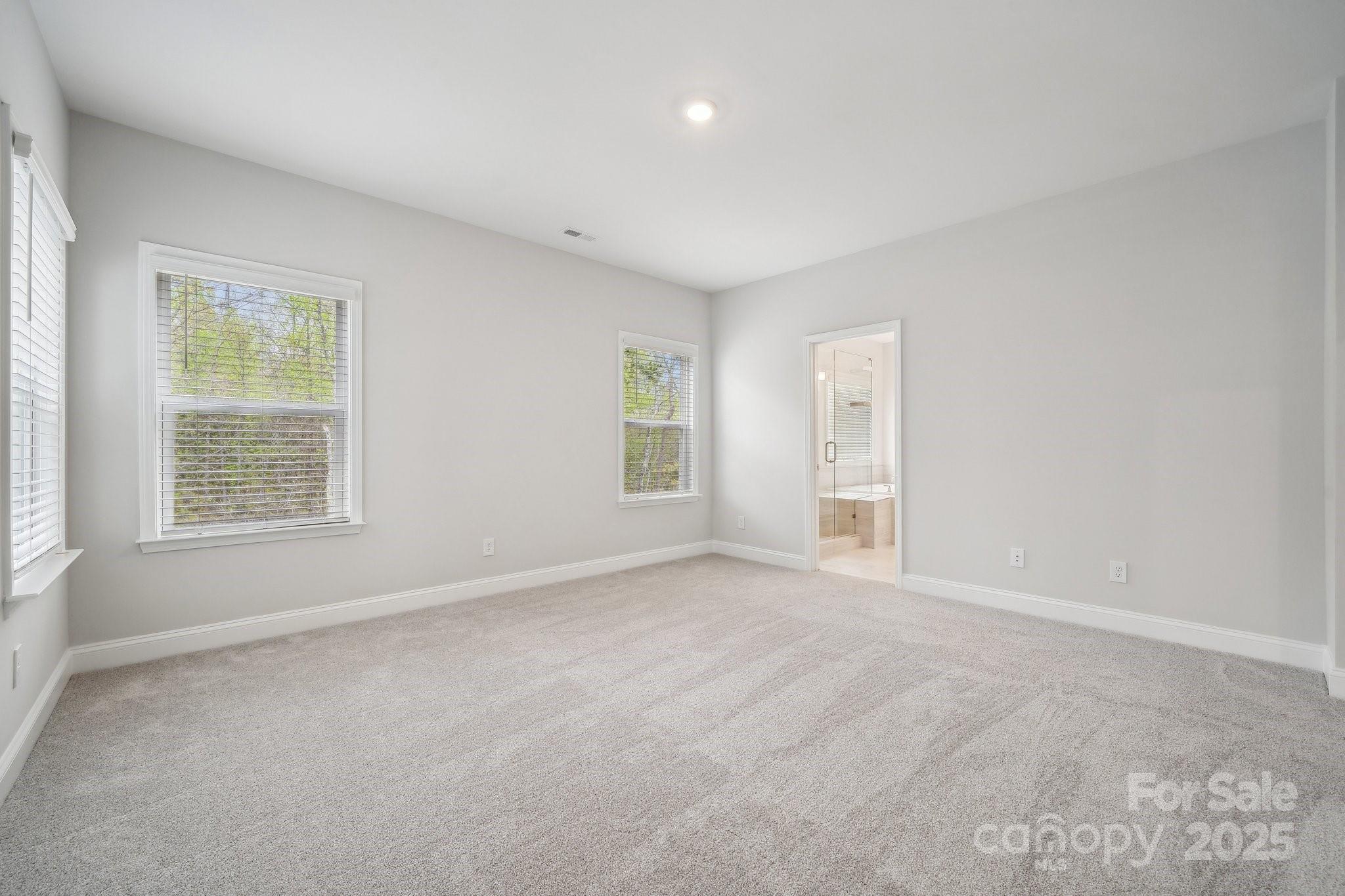 5088 Duval Circle Tega Cay, SC 29708 - Photo 27 of 41 an empty room with windows