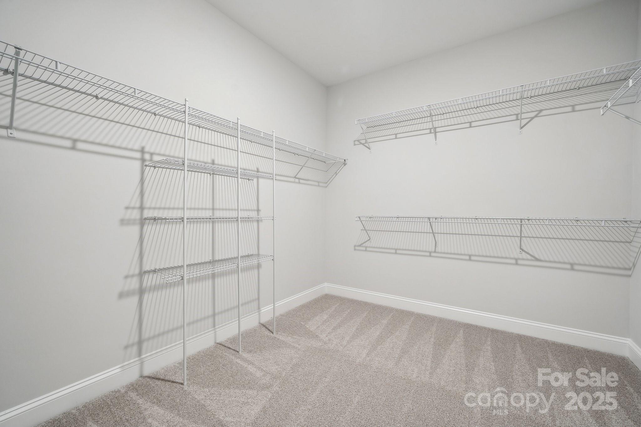 5088 Duval Circle Tega Cay, SC 29708 - Photo 33 of 41 a view of a room with racks on the wall