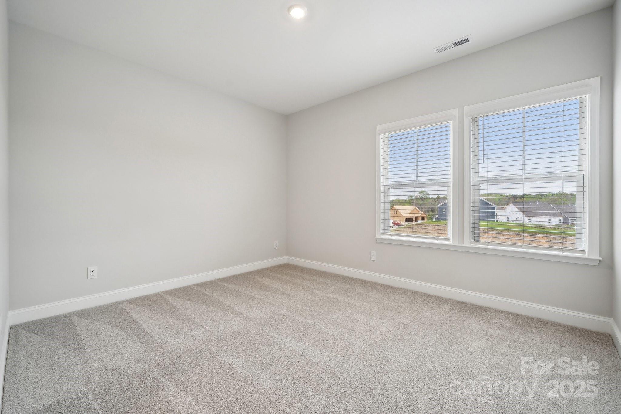 5088 Duval Circle Tega Cay, SC 29708 - Photo 35 of 41 an empty room with windows