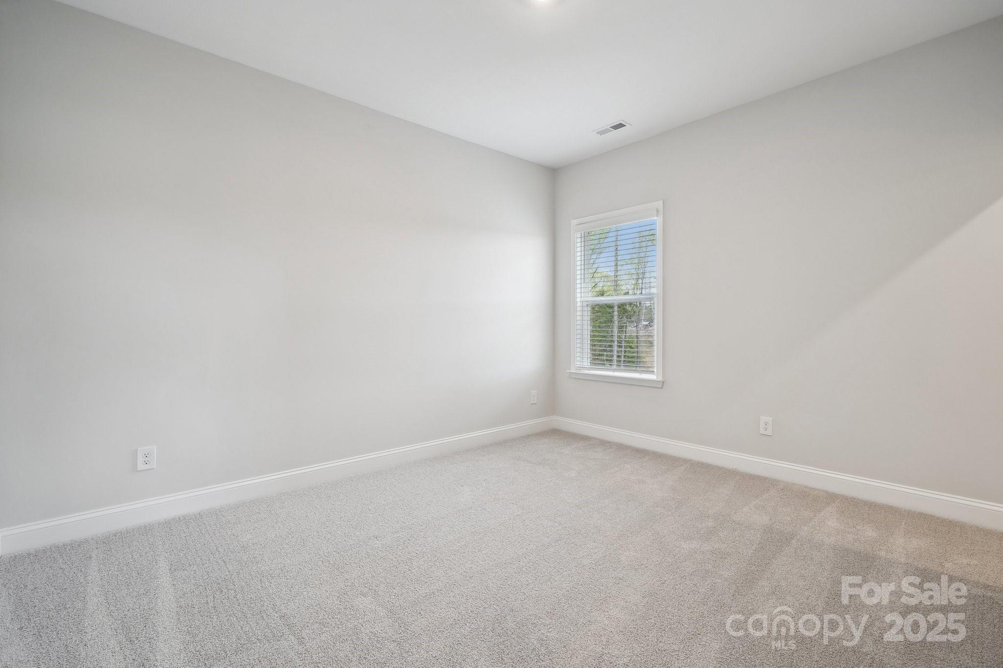 5088 Duval Circle Tega Cay, SC 29708 - Photo 37 of 41 an empty room with a window