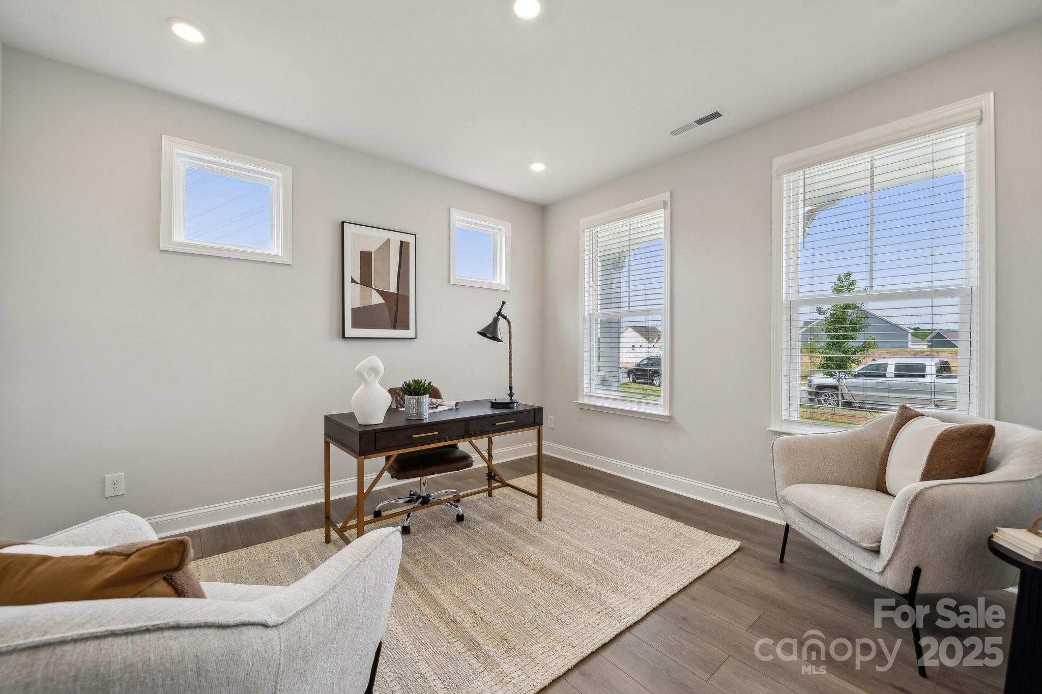 5088 Duval Circle Tega Cay, SC 29708 - Photo 8 of 41 a living room with furniture and a window