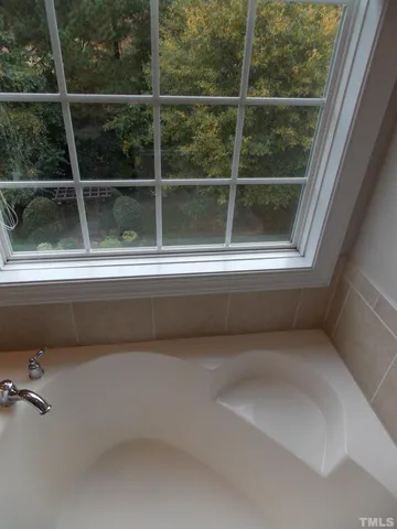 a view of a bathroom with a window