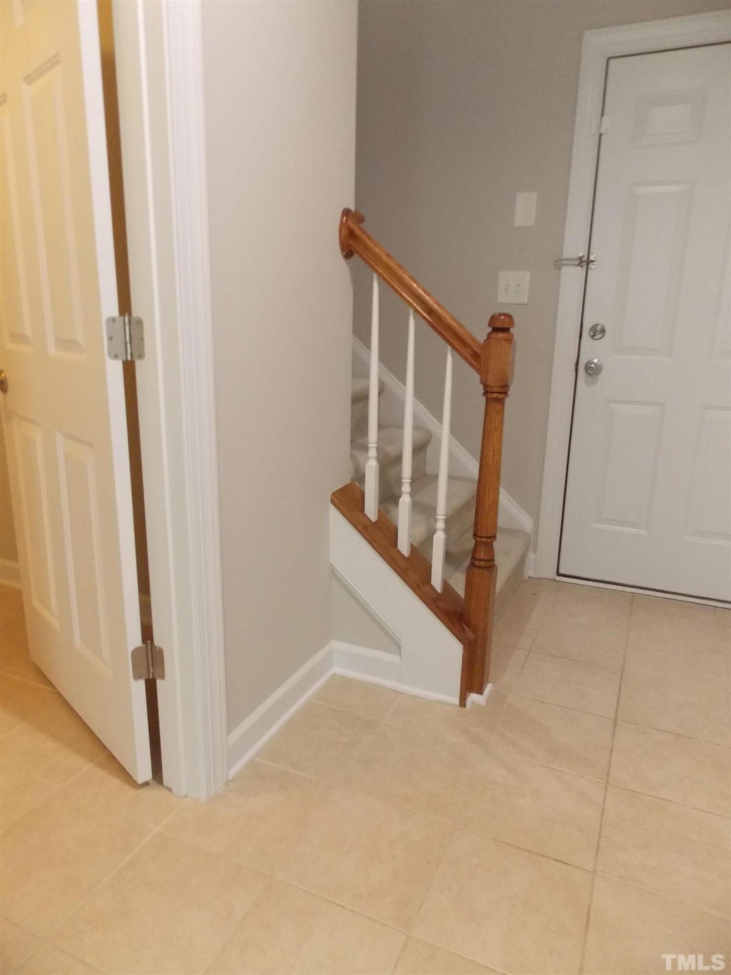 4032 Abbey Park Way Raleigh, NC 27612 - Photo 24 of 35 an entryway with staircase