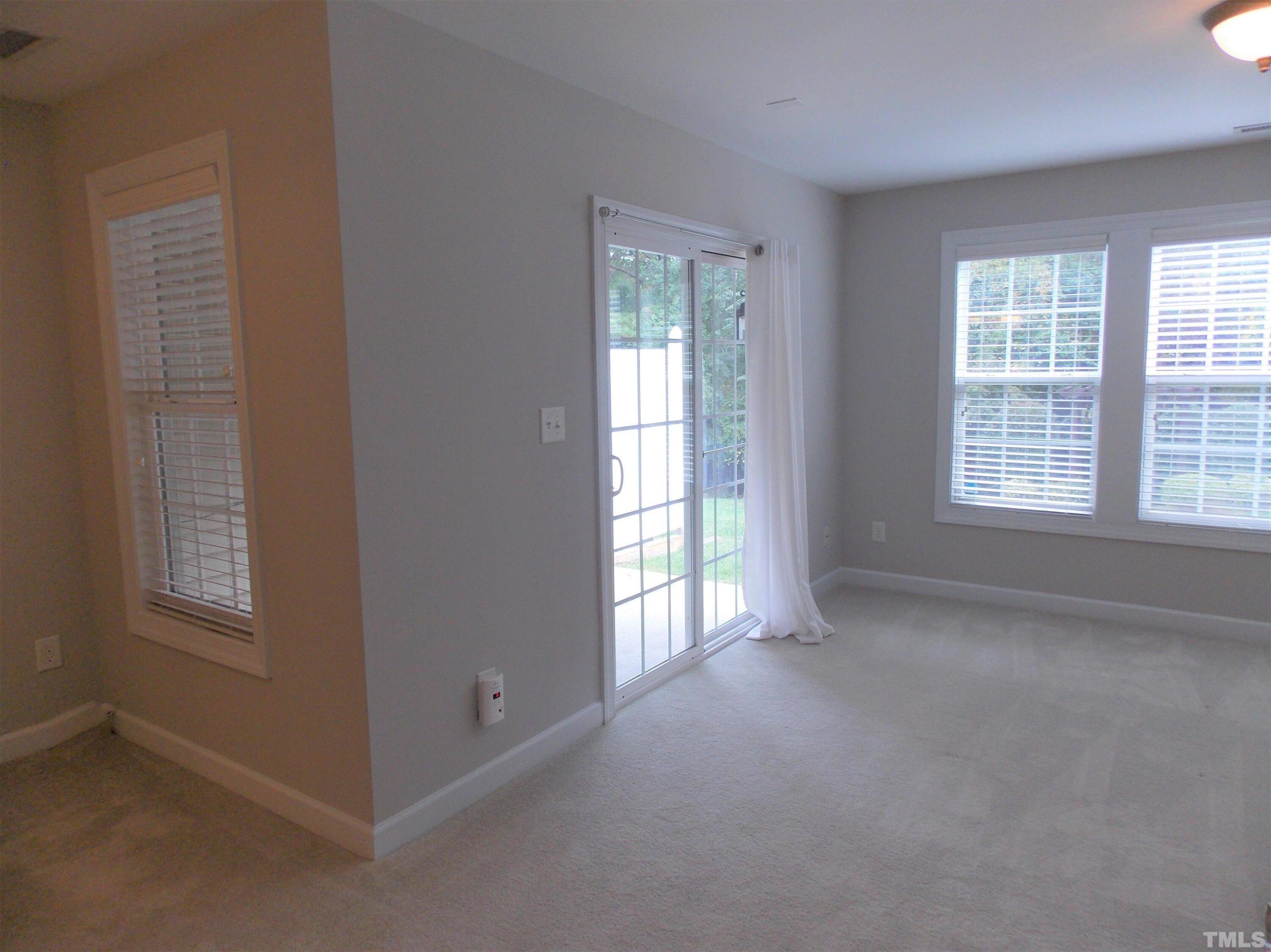 4032 Abbey Park Way Raleigh, NC 27612 - Photo 27 of 35 an empty room with windows