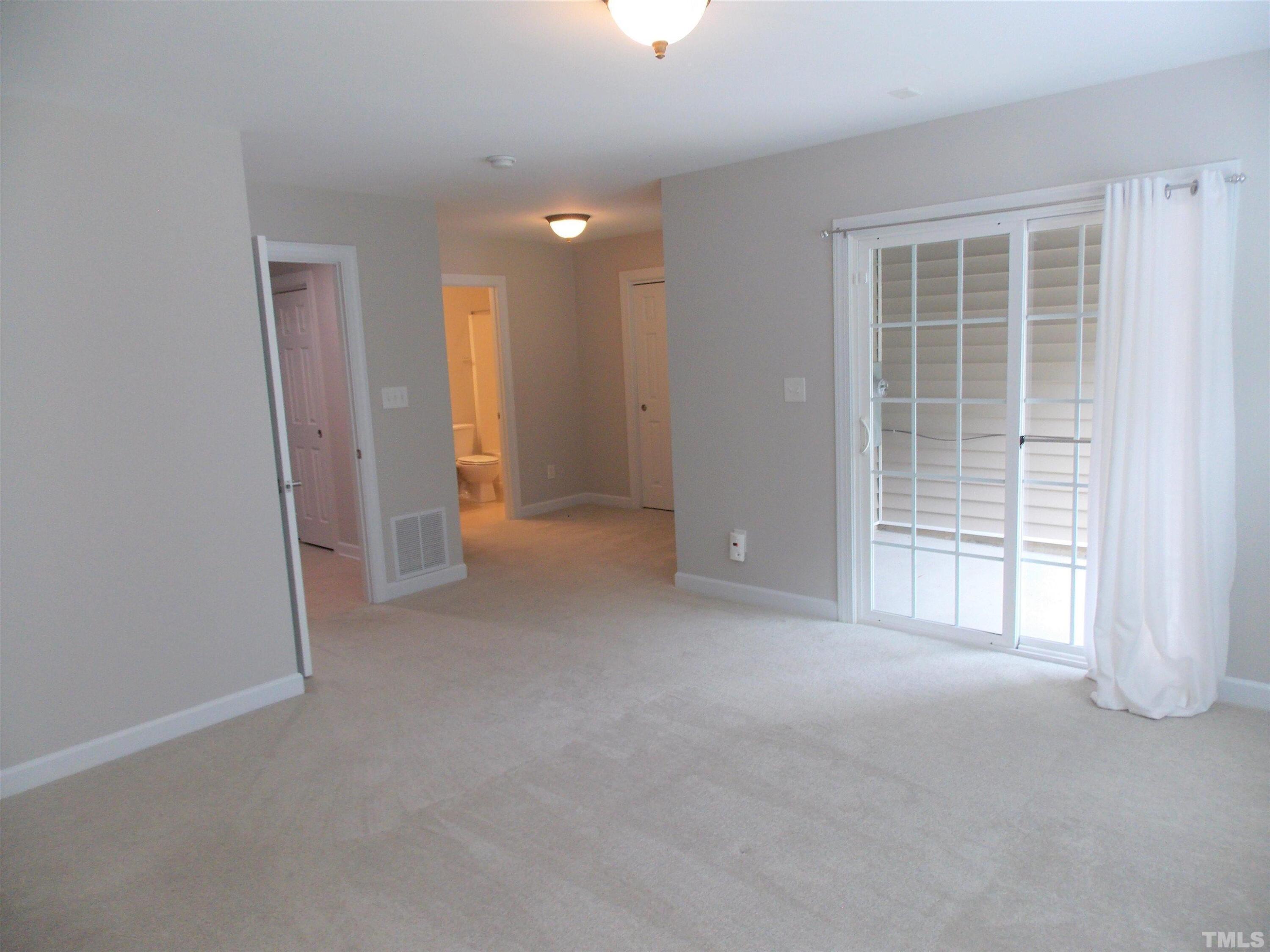 4032 Abbey Park Way Raleigh, NC 27612 - Photo 29 of 35 a view of empty room with windows
