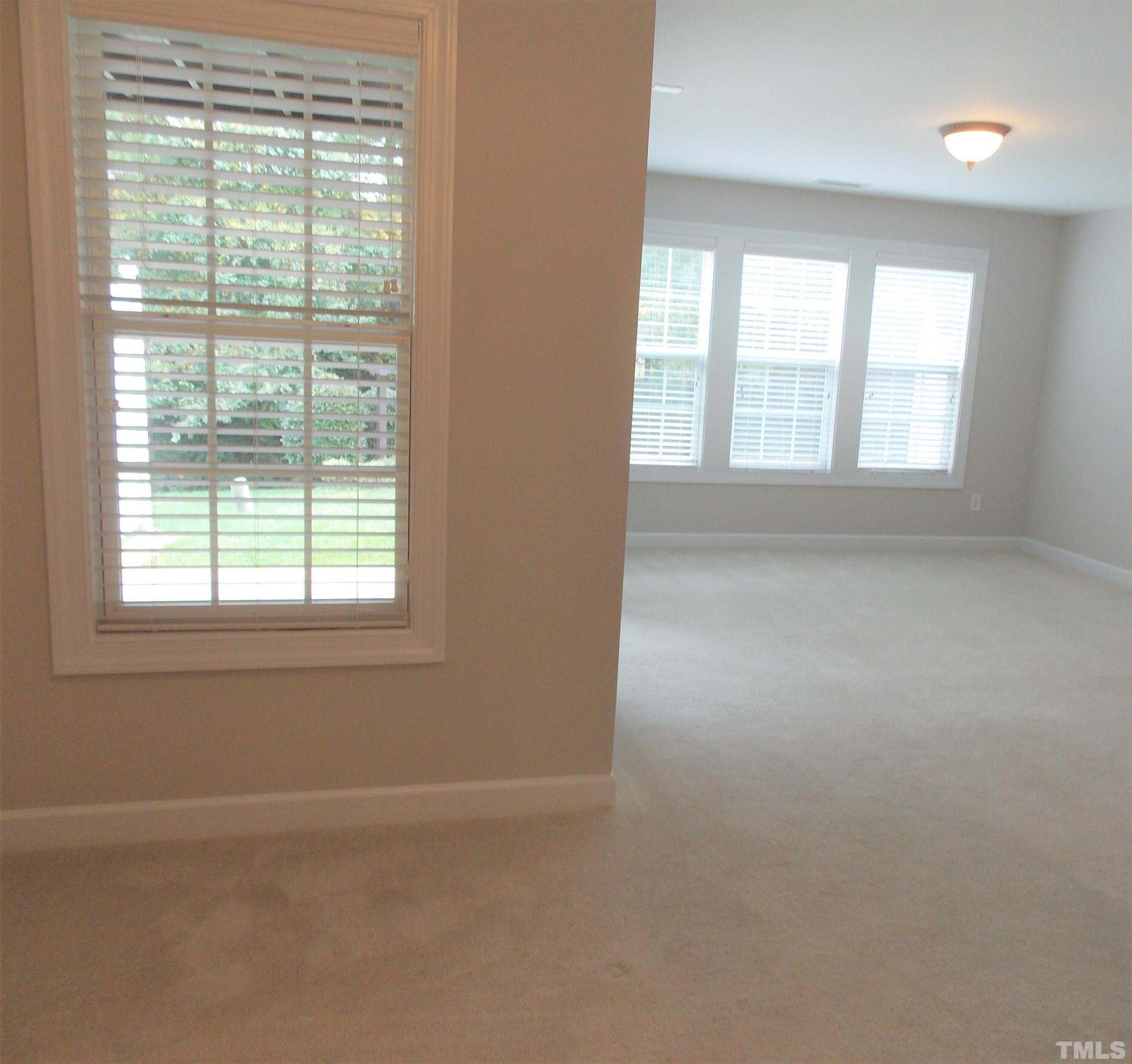 4032 Abbey Park Way Raleigh, NC 27612 - Photo 31 of 35 an empty room with a window