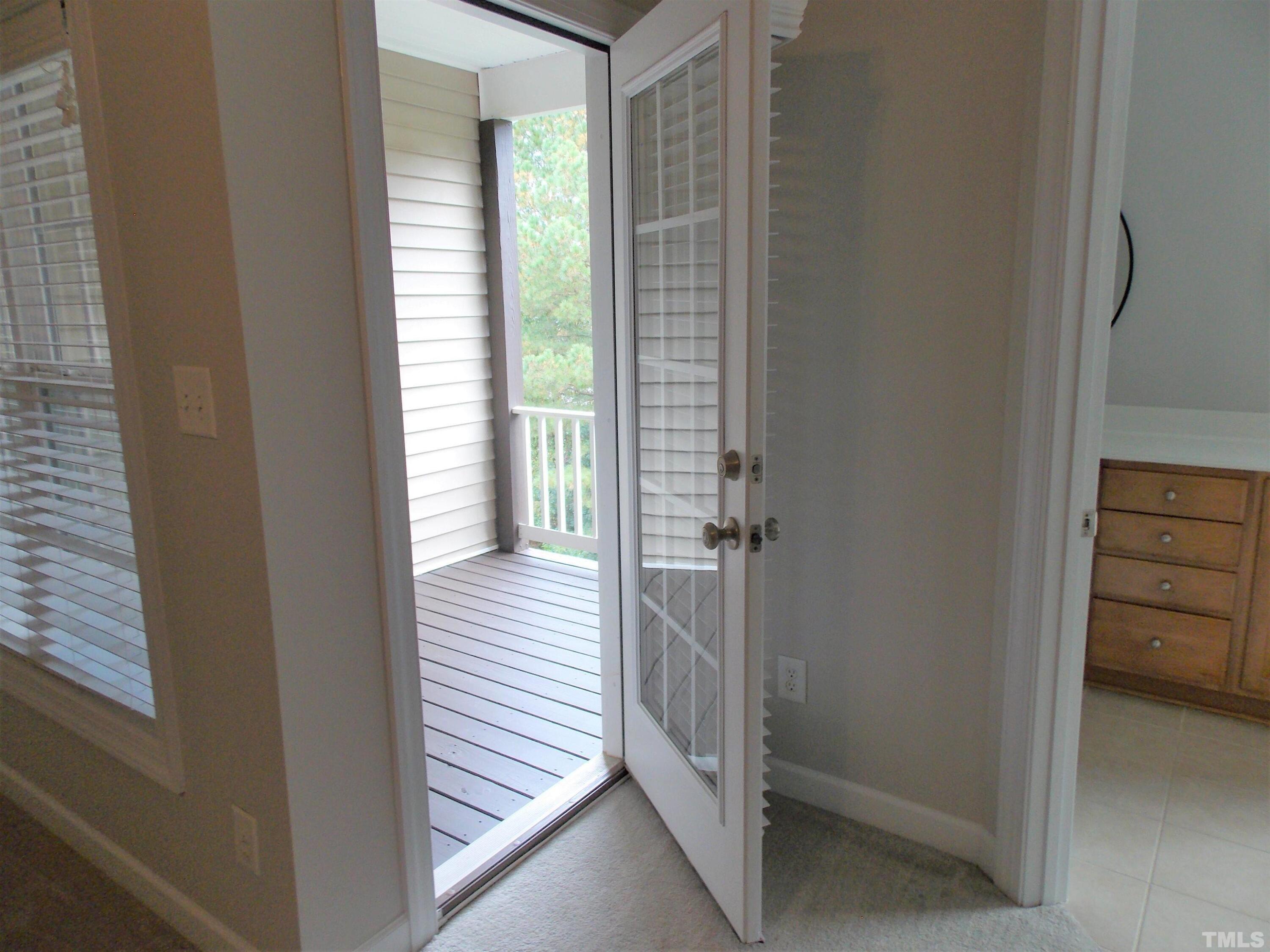 4032 Abbey Park Way Raleigh, NC 27612 - Photo 34 of 35 a view of a hallway with a bedroom