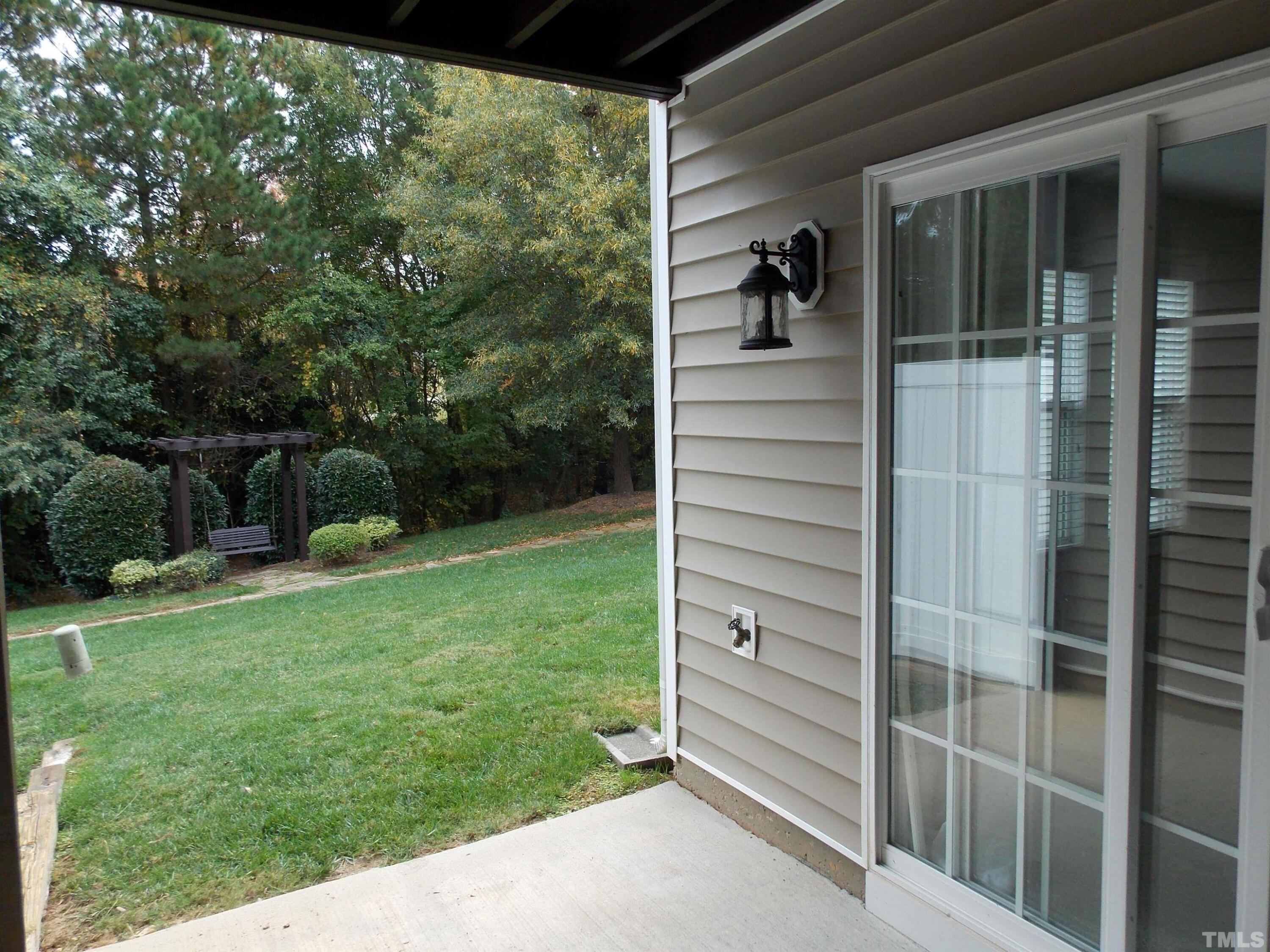 4032 Abbey Park Way Raleigh, NC 27612 - Photo 35 of 35 a view of a door and a window in the house