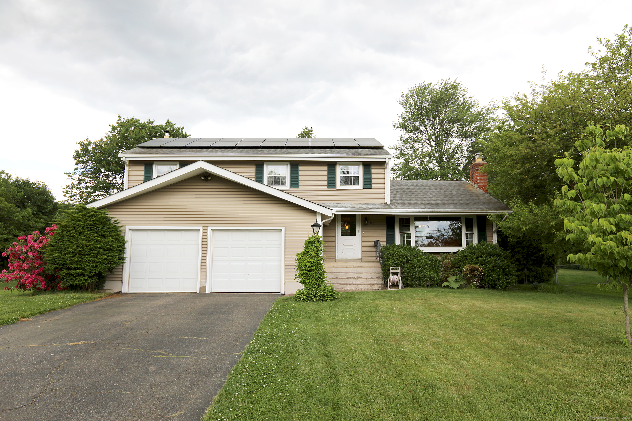 82 Robin Road Windsor, CT 06095 - Photo 1 of 1 front view of a house with a yard
