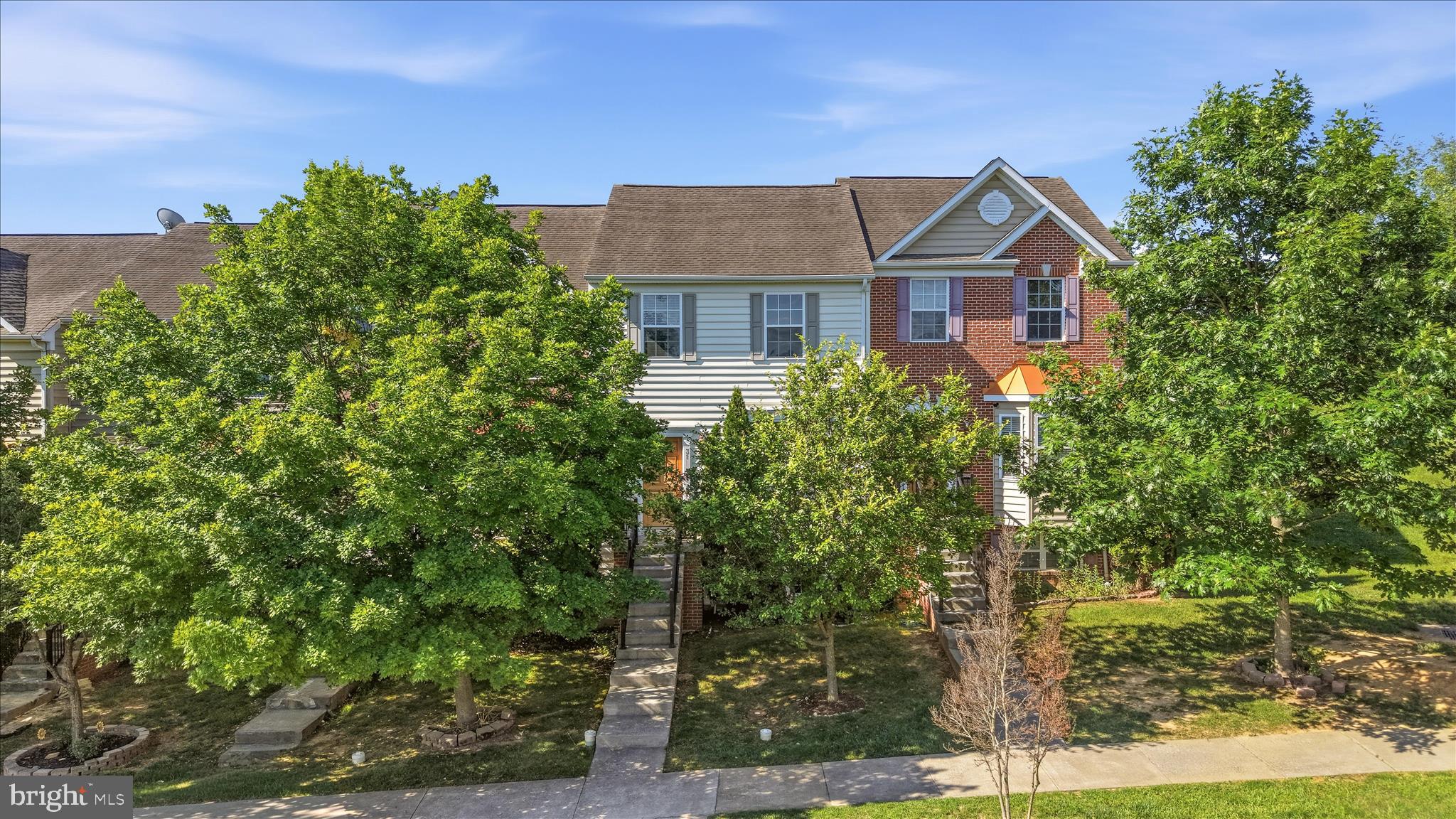 Spacious 3-level townhome backing to trees