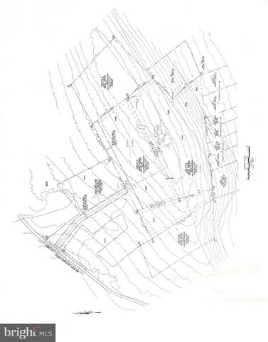 a kitchen with kitchen island granite countertop wooden cabinets a refrigerator and a sink