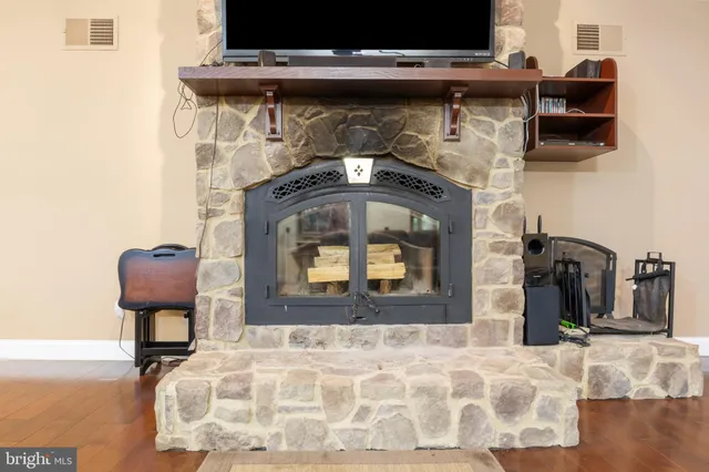 a room with furniture and a flat screen tv