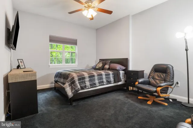 a view of a chairs setting on the roof deck