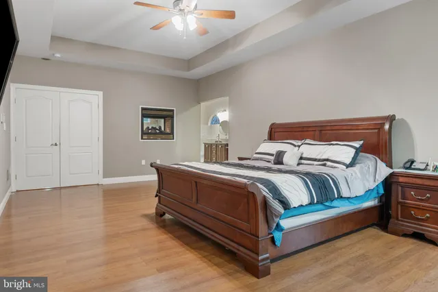 a view of a field with an ocean view