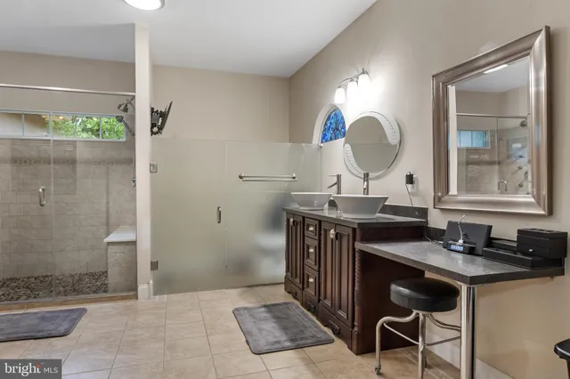 an aerial view of a house with a lake view