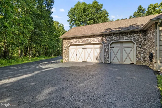 a house with trees in the background