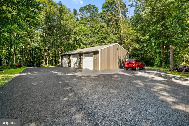 a view of outdoor space with deck and garden