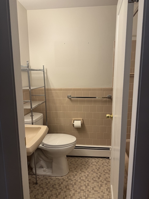 100 Magnolia Avenue, Unit 4 Lynn, MA 01904 - Photo 18 of 19 a bathroom with a toilet and a shower