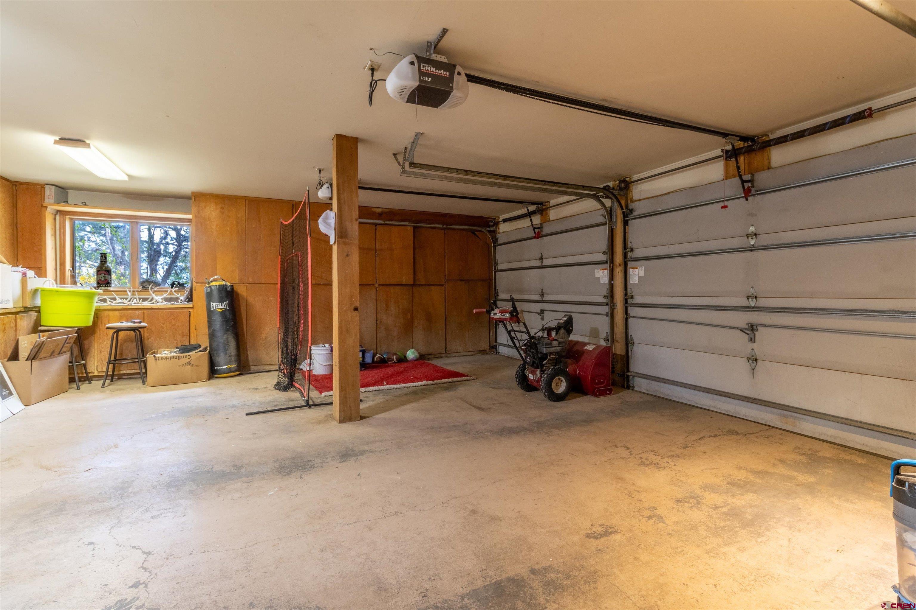 67 Pine Ridge Loop Durango, CO 81301 - Photo 28 of 35 a view of a garage with storage