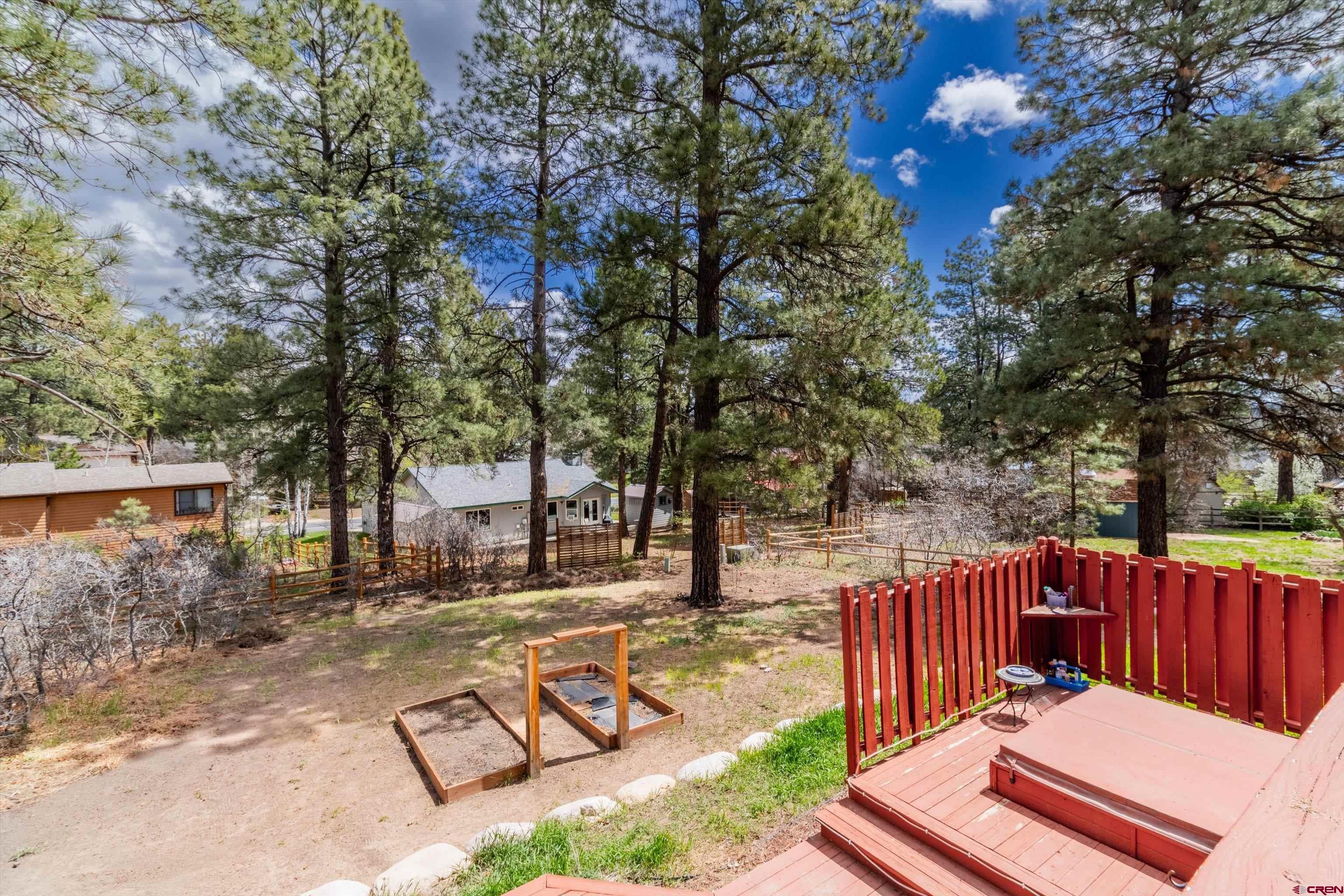 67 Pine Ridge Loop Durango, CO 81301 - Photo 30 of 35 a view of a bench in a backyard