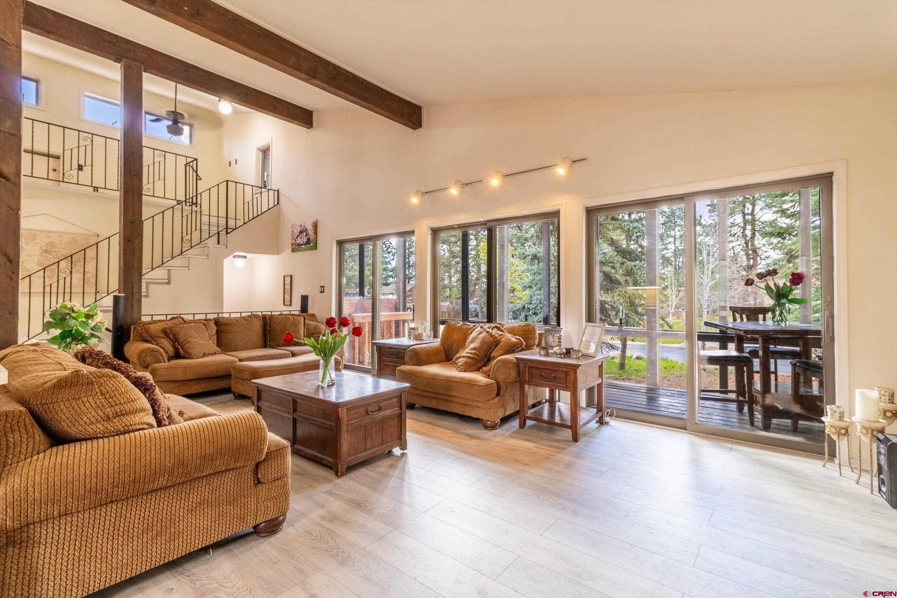 67 Pine Ridge Loop Durango, CO 81301 - Photo 7 of 35 a living room with furniture and a large window