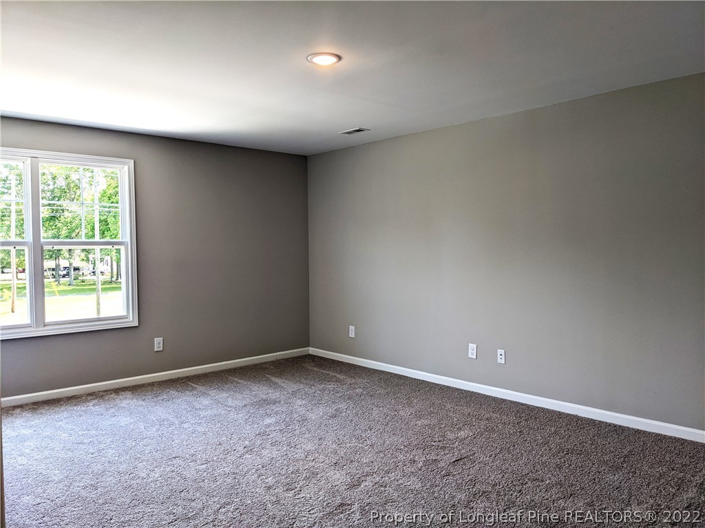 2903 Rockfish Road Raeford, NC 28376 - Photo 17 of 28 a view of an empty room with a window