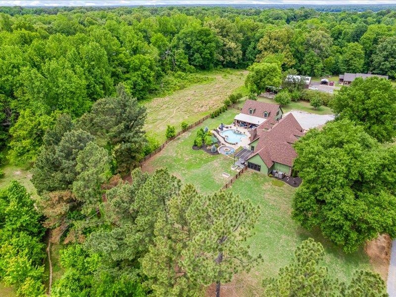 8104 Jack Bond Road Arlington, TN 38002 - Photo 36 of 40 an aerial view of residential house with outdoor space and trees all around