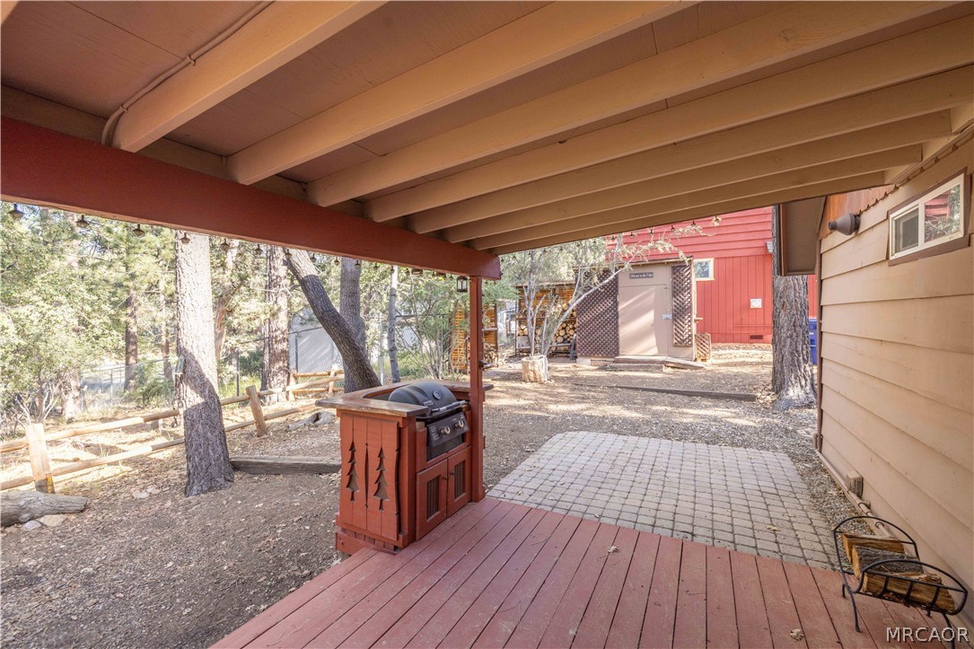 773 Sunset Lane Sugarloaf, CA 92386 - Photo 27 of 33 a view of a porch with wooden floor and outdoor space