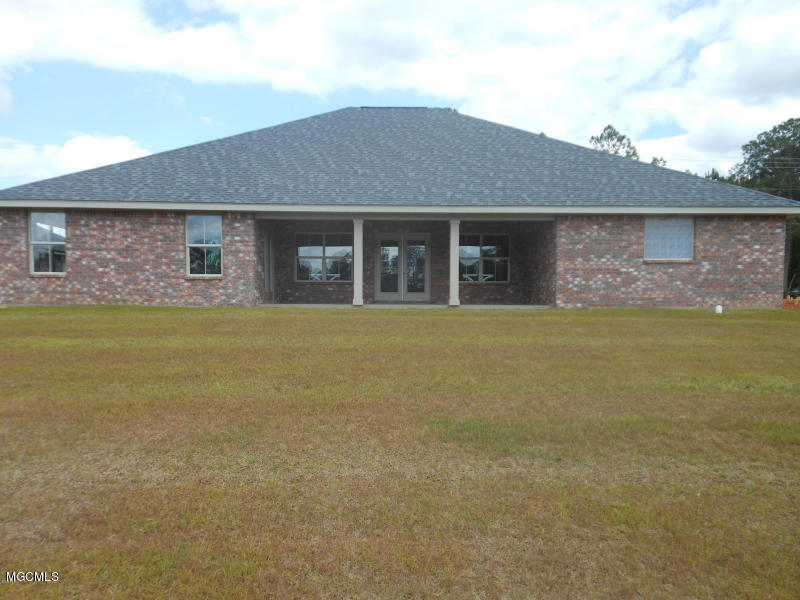 6865 Biddix Evans Road Ocean Springs, MS 39564 - Photo 17 of 18 Covered back patio