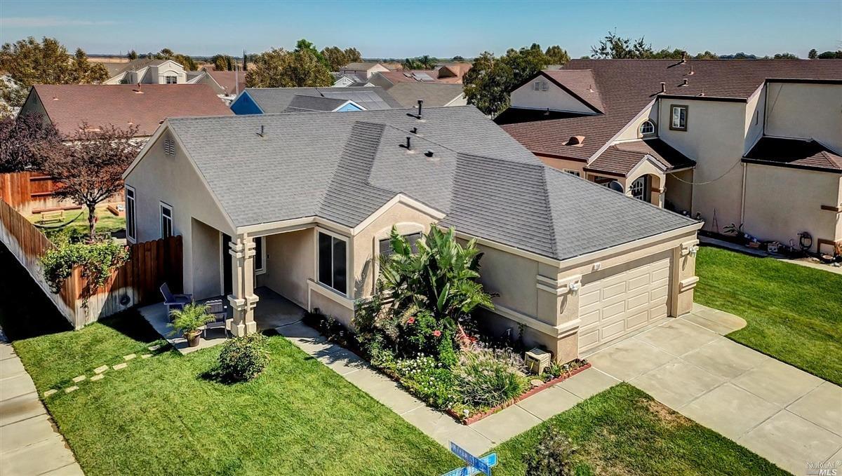 742 Allender Way Rio Vista, CA 94571 - Photo 1 of 1 an aerial view of a house with a big yard plants and large trees