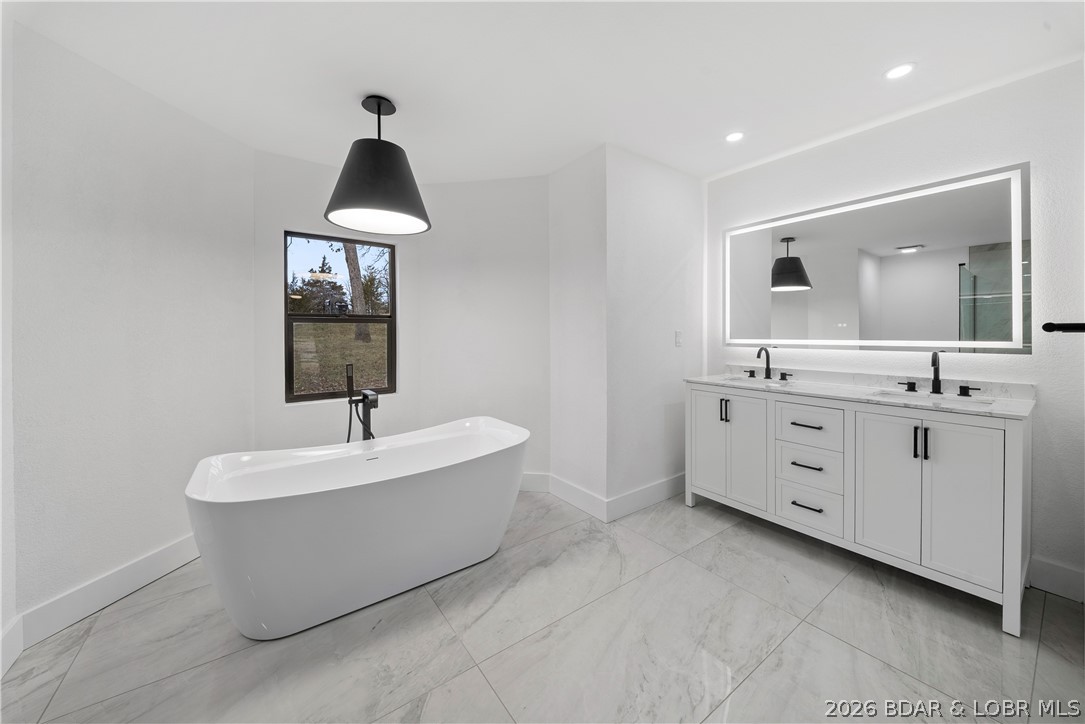 1729 Chimney Point Sunrise Beach, MO 65079 - Photo 23 of 78 Primary Bathroom