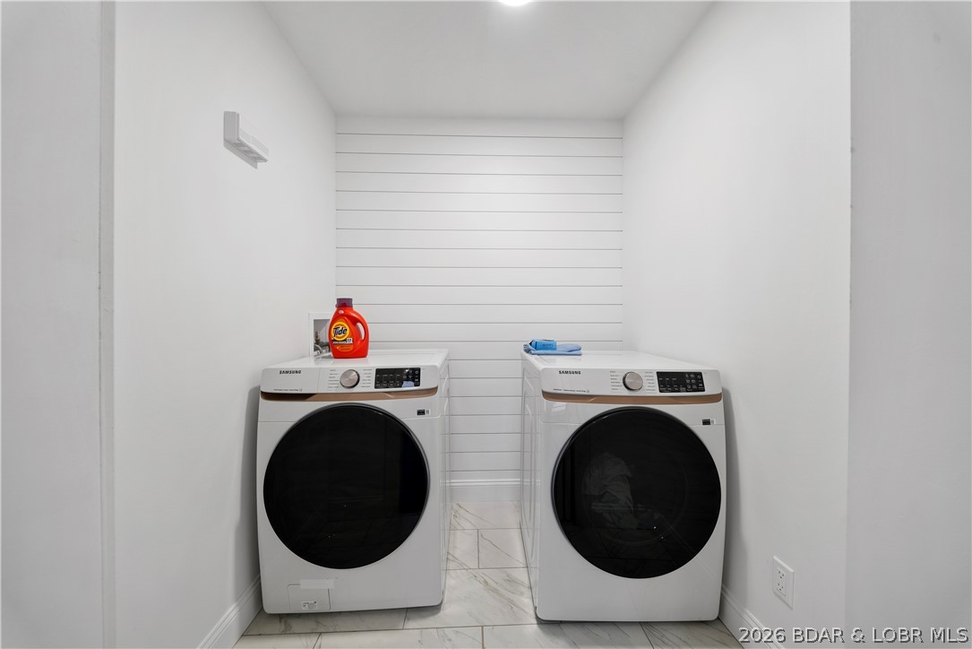 1729 Chimney Point Sunrise Beach, MO 65079 - Photo 26 of 78 Main Level Laundry