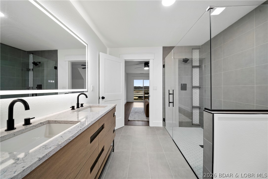 1729 Chimney Point Sunrise Beach, MO 65079 - Photo 34 of 78 En-Suite Bath