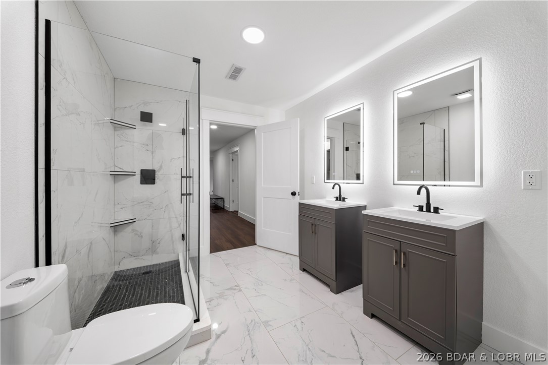 1729 Chimney Point Sunrise Beach, MO 65079 - Photo 38 of 78 Bathroom on Upper-Level