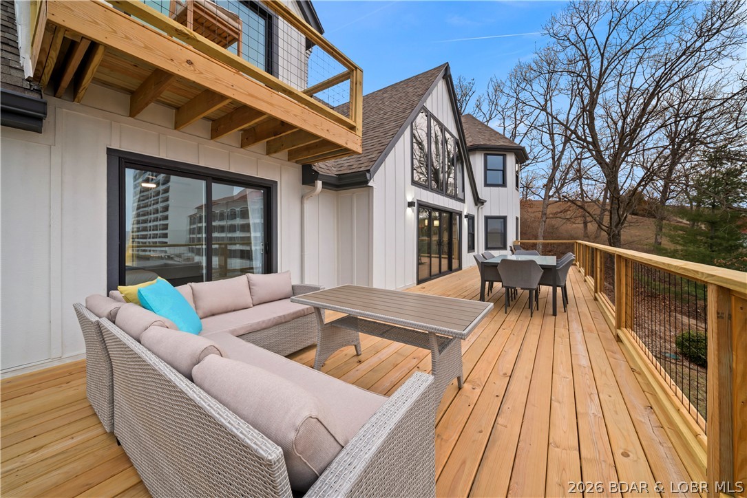 1729 Chimney Point Sunrise Beach, MO 65079 - Photo 4 of 78 Spacious Back Deck Right off the Main Level