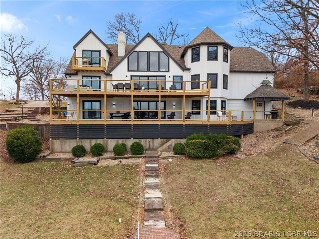 1729 Chimney Point Sunrise Beach, MO 65079 - Photo 62 of 78 Back of the Home w/ 3 Decks