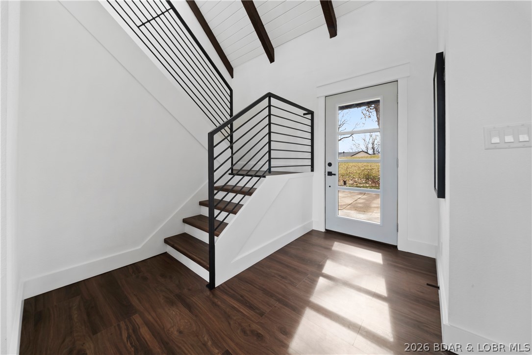 1729 Chimney Point Sunrise Beach, MO 65079 - Photo 70 of 78 Entryway + Stairs to Upper Level
