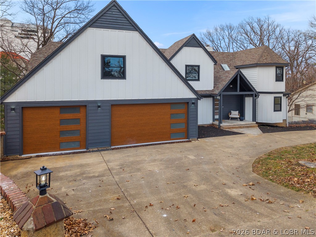 1729 Chimney Point Sunrise Beach, MO 65079 - Photo 72 of 78 Gentle Driveway + 3 Car Garage
