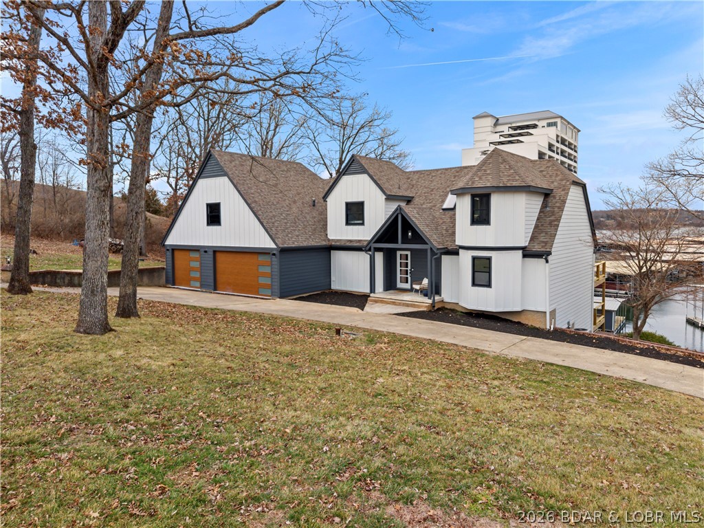 1729 Chimney Point Sunrise Beach, MO 65079 - Photo 73 of 78 Front of House + Spacious Yard