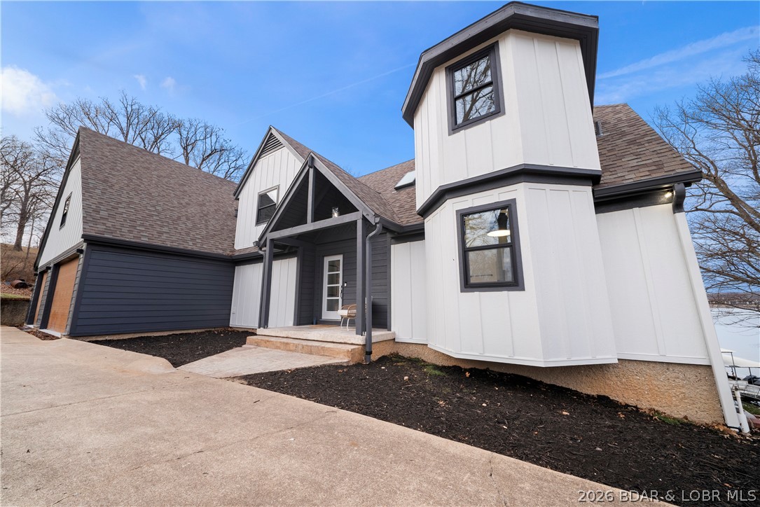 1729 Chimney Point Sunrise Beach, MO 65079 - Photo 75 of 78 Front of House