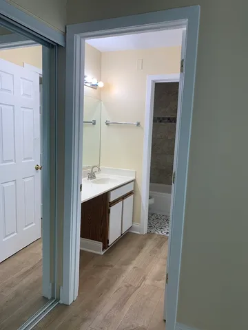 a bathroom with a bathtub and a toilet