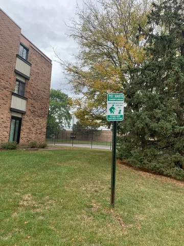a view of a pathway both side of yard