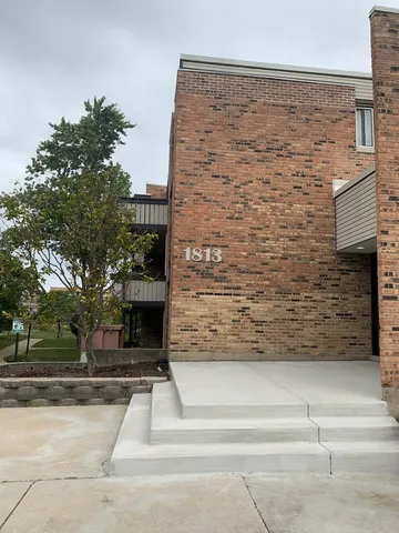 a front view of a house with glass door
