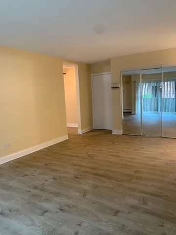 a view of an empty room and window