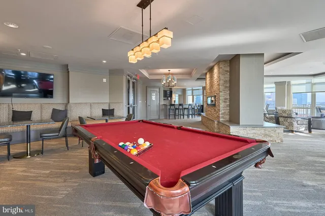 a lobby with furniture and a large window