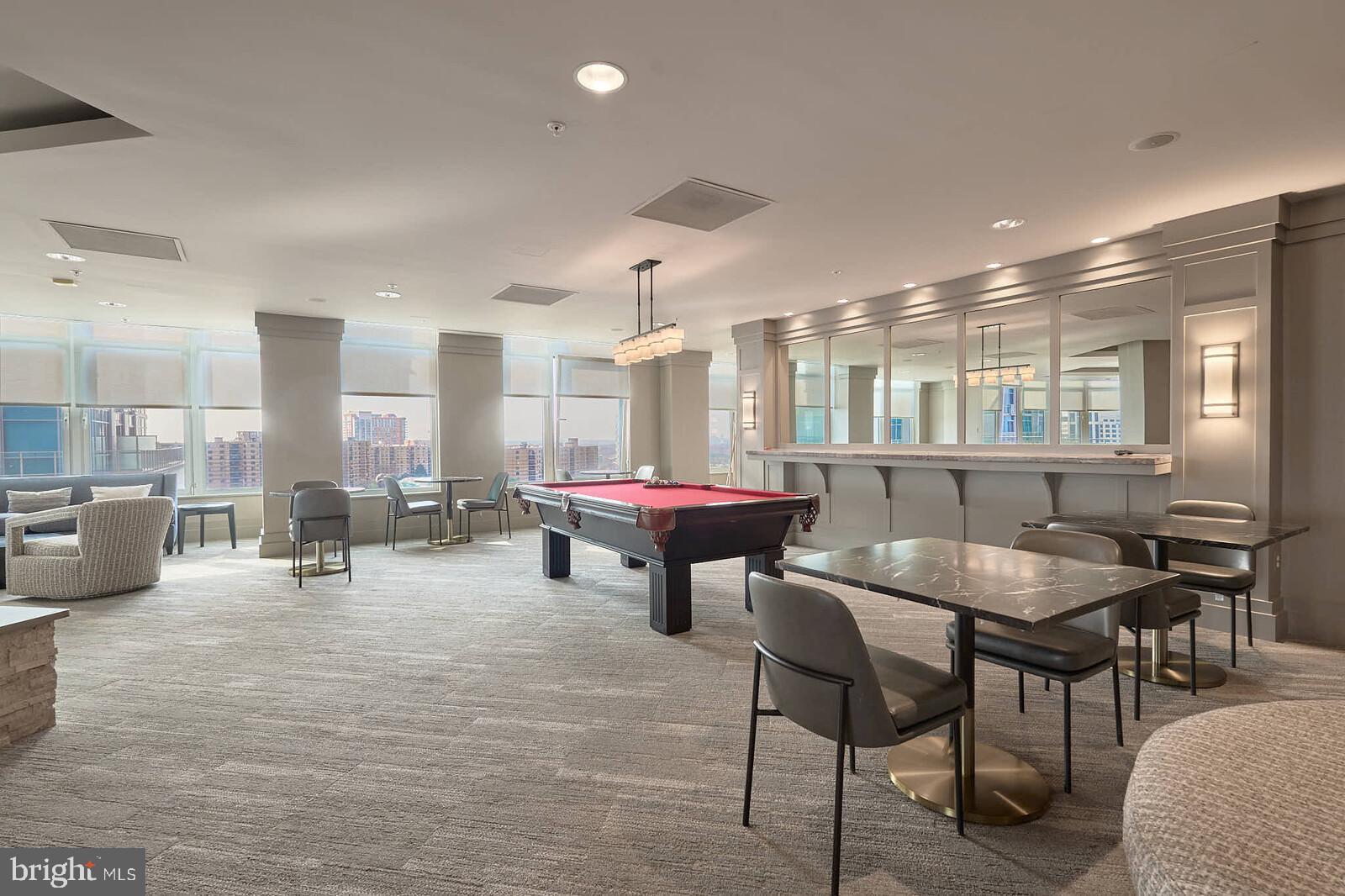 8220 Crestwood Heights Drive, Unit 714 McLean, VA 22102 - Photo 25 of 34 a lobby with furniture and a large window