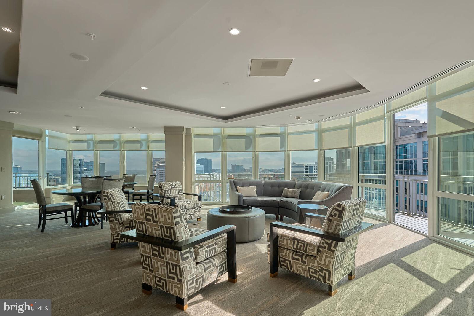 8220 Crestwood Heights Drive, Unit 714 McLean, VA 22102 - Photo 27 of 34 a living room with furniture and a large window